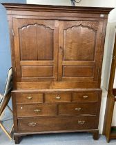 Early 19th century Welsh oak Cardiganshire two stage press cupboard now converted to a wardrobe,
