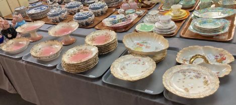 Two trays of Doulton Burslem to include: floral design dessert plates and pedestal dishes, centre