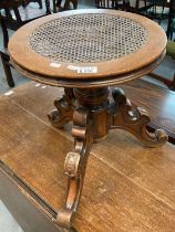 Victorian adjustable tripod walnut piano stool with probably later cane seat. (B.P. 21% + VAT)