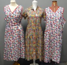 Vintage 1940's/50's multi-colour cotton floral print dress, together with two 1940's printed aprons;