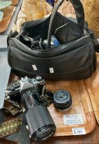 Tray of cameras and camera equipment, camcorder etc. to particularly include a Cannon AE1. (B.P. 21%