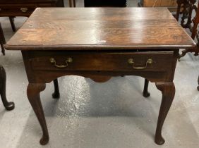 18th century style oak lowboy, the moulded top above a single drawer standing on cabriole legs and