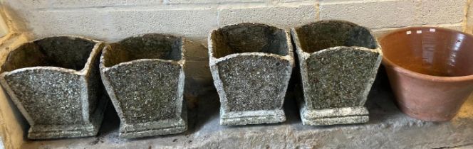 Group of four reconstituted stone square shaped planters, together with a traditional Welsh