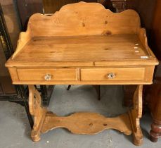 Victorian style pine wash stand, the gallery back above two drawers with fluted glass knob