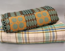 Two vintage woollen blankets or carthen to include; a Welsh tapestry blanket with traditional