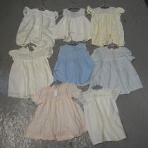 Collection of vintage 1920's-60's children's and babies clothing to include: cotton dresses with