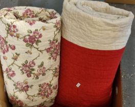 Box containing two vintage cotton quilts; one floral printed and one red and white patchwork