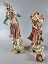 Pair of Royal Dux depicting a Gallant and a young lady, shape No. 491 and 492. 35cm high approx. (2)