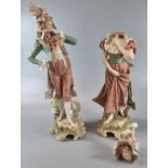 Pair of Royal Dux depicting a Gallant and a young lady, shape No. 491 and 492. 35cm high approx. (2)