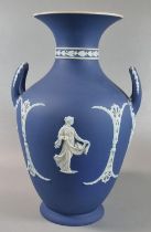 Late 19th early 20th century Wedgwood blue and white Jasperware two handled vase depicting relief