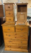 Modern pine straight front chest of two short and three long drawers on a platform base together