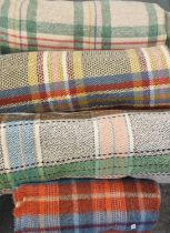 Box of vintage woollen blankets to include: various check blankets and a check throw. (4) (B.P.