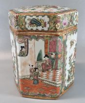 Large porcelain hexagonal jar and cover decorated in a Canton Famille Rose style, with scroll framed