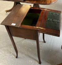 Edwardian mahogany table top revolving bookcase together with a mahogany inlaid ladies workbox. (