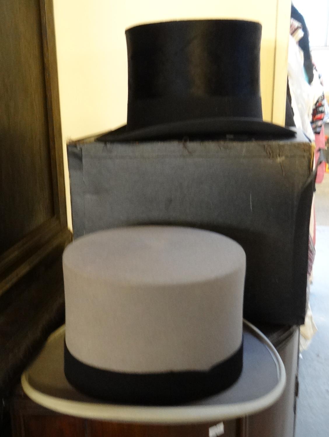 Vintage hat box containing a Henry Heath Ltd fur felt top hat, together with a grey Woodrow of