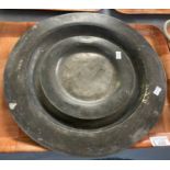 Large 18th century pewter charger together with two smaller chargers/dishes. (3) (B.P. 21% + VAT)