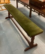 Mahogany upholstered bench of rectangular form with central fluted stretcher. (B.P. 21% + VAT)
