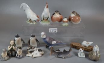 Collection of sixteen Danish Royal Copenhagen porcelain figurines, mainly animals, some Mermaids