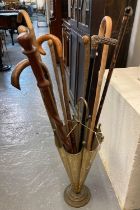 Novelty brass umbrella/stick stand in the form of an umbrella together with assorted walking sticks.