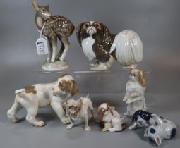 Collection of seven Royal Copenhagen porcelain animal figurines to include: Pekinese dogs,