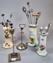 An extensive collection of early 20th century/Art Nouveau and other hatpins, many contained in