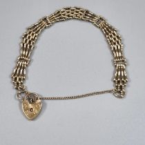 9ct gold four bar gate bracelet with heart shaped padlock. 17g approx. (B.P. 21% + VAT)