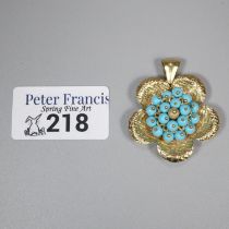 18ct gold Italian flowerhead design pendant with a cluster of turquoise stones, signed 'Ronco'. 3.