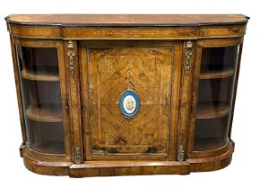 Victorian walnut bow and break front credenza, the moulded top above inlaid frieze, the central