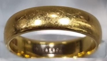 22ct gold wedding band. 9.5g approx. Ring size N. (B.P. 21% + VAT)