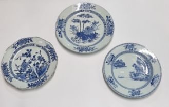Three 18th Century Chinese export blue and white porcelain chargers depicting pagodas near a lake,