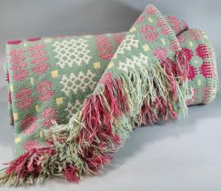 Vintage woollen Welsh tapestry green ground blanket or carthen with fringed edges and traditional
