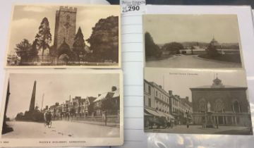 Carmarthen postcards in album with early to modern postcards, various street scenes from around