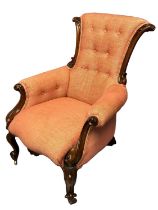 Victorian mahogany show frame button backed gentleman's chair, having upholstered arms and