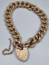 Victorian 9ct gold curb link bracelet with engraved heart shaped locket. 19.6g approx. (B.P. 21% +