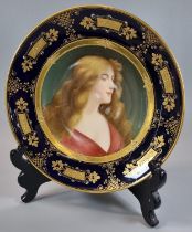 Late 19th/early 20th Century Vienna porcelain dish with painted head and shoulders of a maiden,