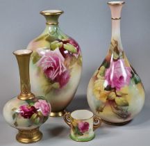 Collection of three Royal Worcester porcelain vases, all hand painted with roses and foliage, one