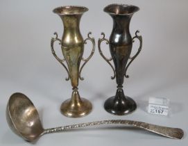 Pair of Art Nouveau silver two handled vases with loaded bases, maker's mark HM. Birmingham, 1912.