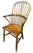 19th Century elm and ash stick back fireside elbow chair with moulded seat on turned legs. (B.P. 21%