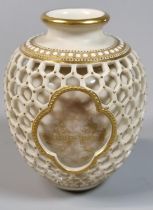 Early 20th century Royal Worcester double walled reticulated vase, probably by George Owen, of ovoid