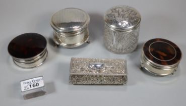 Collection of silver vanity items to include: two similar silver and tortoiseshell dressing table