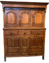 Early 19th Century Welsh oak Deuddarn, having projecting canopy with moulded cornice and drop