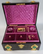 A good quality 19th Century Coromandel gothic design ladies workbox, the case with gilt metal