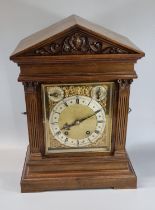 Early 20th Century mahogany cased two train eight day architectural mantel clock in Romanesque style