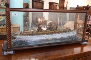 Early 20th Century naive cased ship model of the twin funnel steam passenger vessel Lugania,