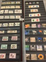 Great Britain collection of unmounted mint stamps 1936-2021 period in seven W.H.Smiths stockbooks.