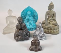 Mixed group of six studies of The Buddha in varying materials including: glass, resin and metal. (6)