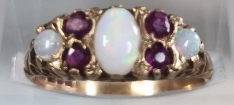 9ct gold opal and ruby ring. 1.8g approx. Size M1/2. (B.P. 21% + VAT)