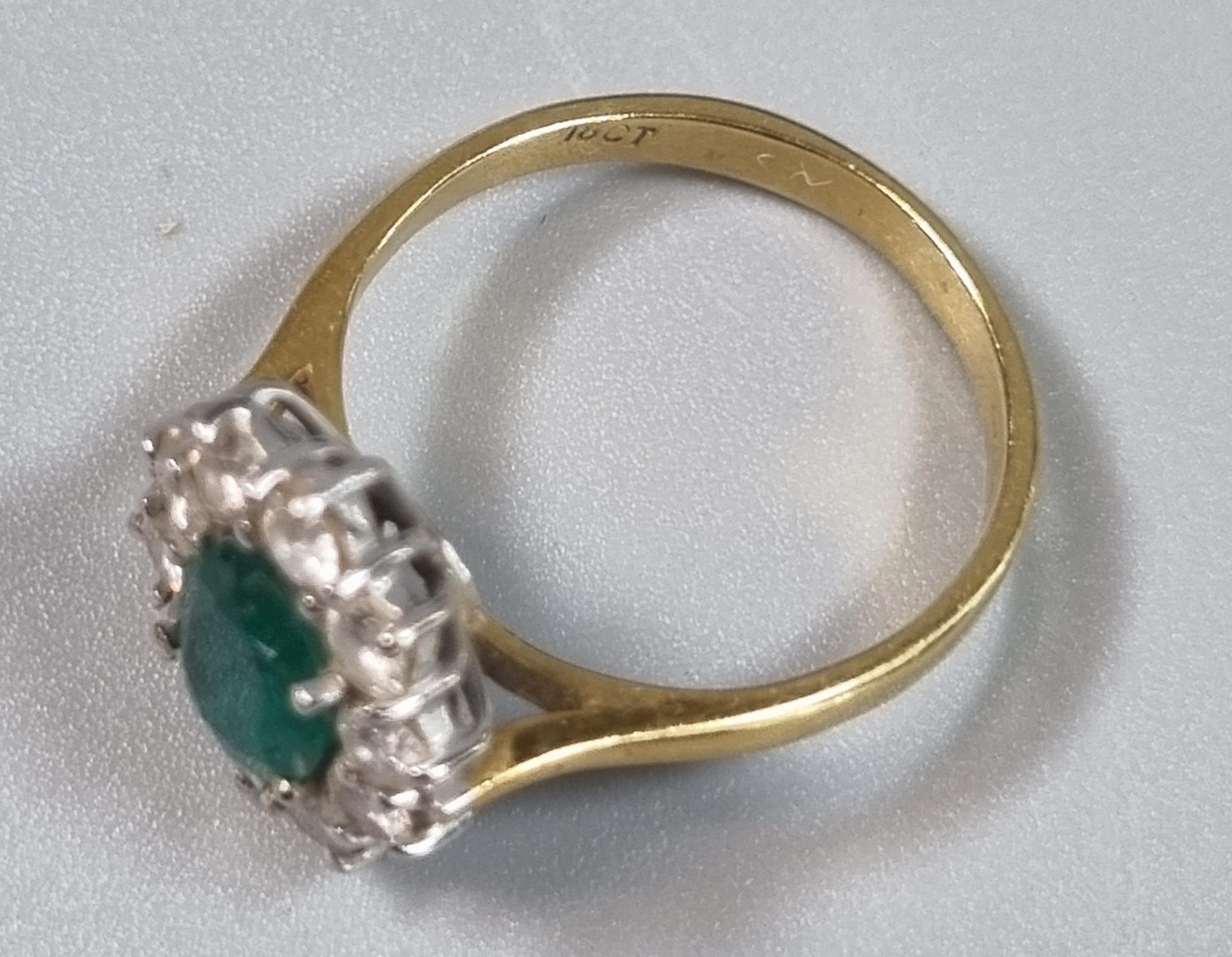 18ct gold flower head ring with ten diamonds and central emerald stone. 3.2g approx. Size J. (B.P. - Image 3 of 6