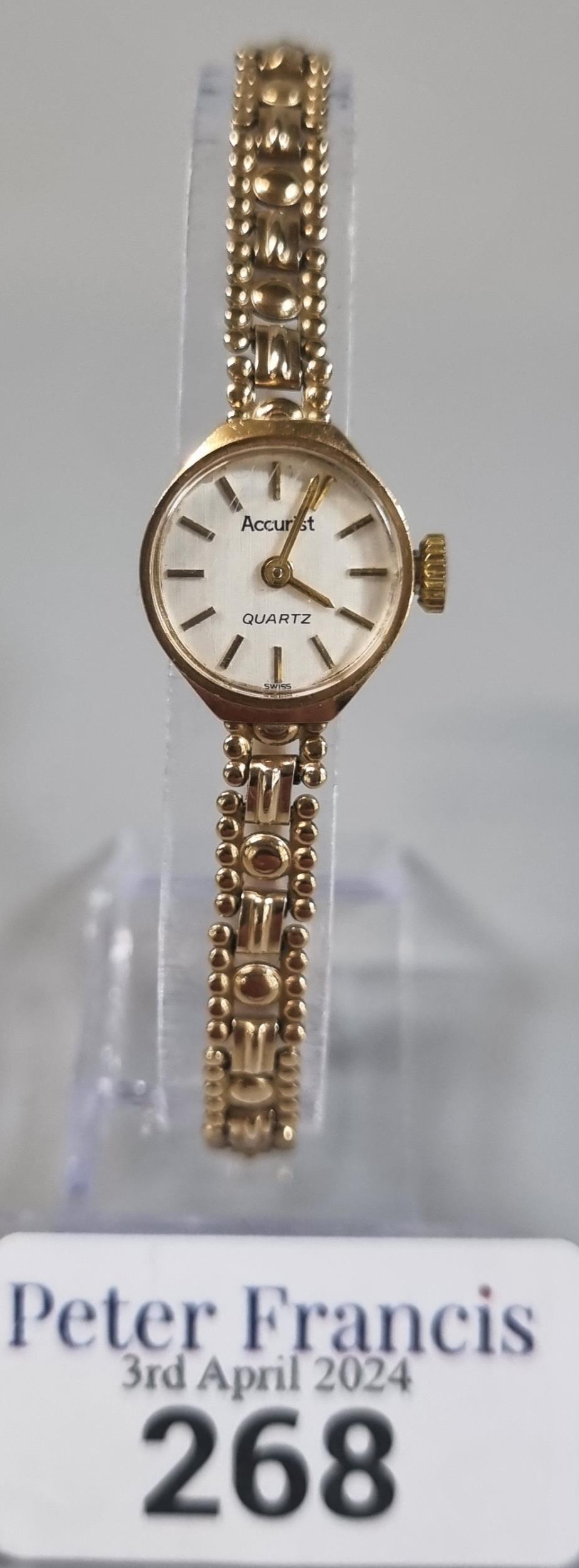 Accurist 9ct gold small head ladies wristwatch with satin face having baton numerals on a 9ct gold - Image 2 of 3