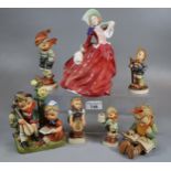 Collection of Hummel and similar figurines together with a Royal Doulton bone china figurine 'Autumn